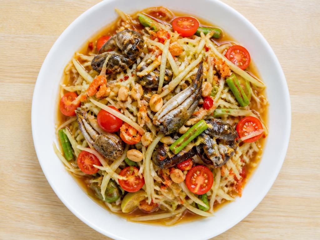 Spicy papaya salad with salted crab and fermented fish
